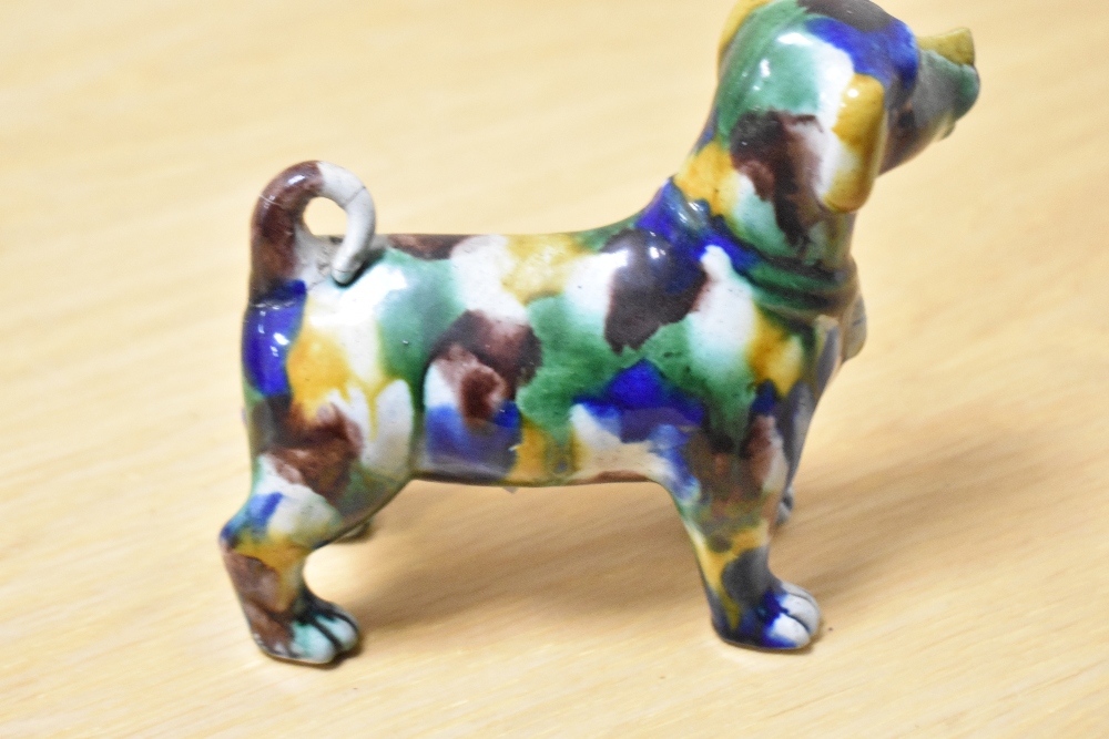 An early 20th Century spongeware glazed dog study, multi-coloured, having repairs to tail and - Image 3 of 4