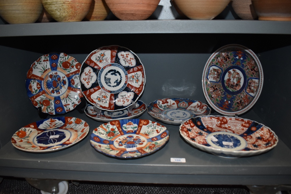 A group of eight 19th/20th Century Imari patterned plates, some having scalloped edges