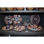 A group of eight 19th/20th Century Imari patterned plates, some having scalloped edges