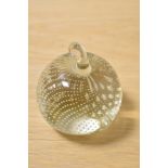 A clear Art Glass controlled bubble paperweight, in the form of an apple, measuring 10cm tall