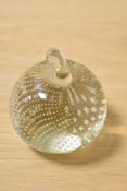 A clear Art Glass controlled bubble paperweight, in the form of an apple, measuring 10cm tall