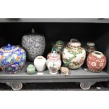 An assorted group of 19th/20th Century Chinese polychrome ginger jars and vases, some with covers,