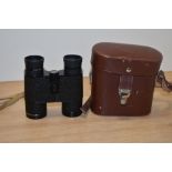 A pair of vintage Carl Zeiss Jena Notarem 8 x 32B binoculars, with brown leather case