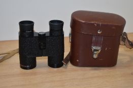 A pair of vintage Carl Zeiss Jena Notarem 8 x 32B binoculars, with brown leather case