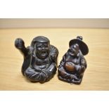 Two Chinese cast resin Buddha figures, the largest measures 5cm tall