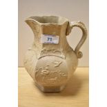 A Victorian Masons Ironstone salt glazed jug, with relief moulded decoration depicting exotic