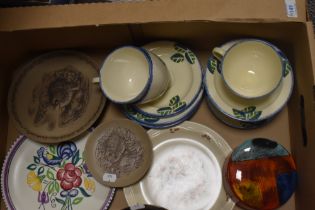 A selection of vintage and modern Poole Pottery, including hand painted cups, saucers and plates