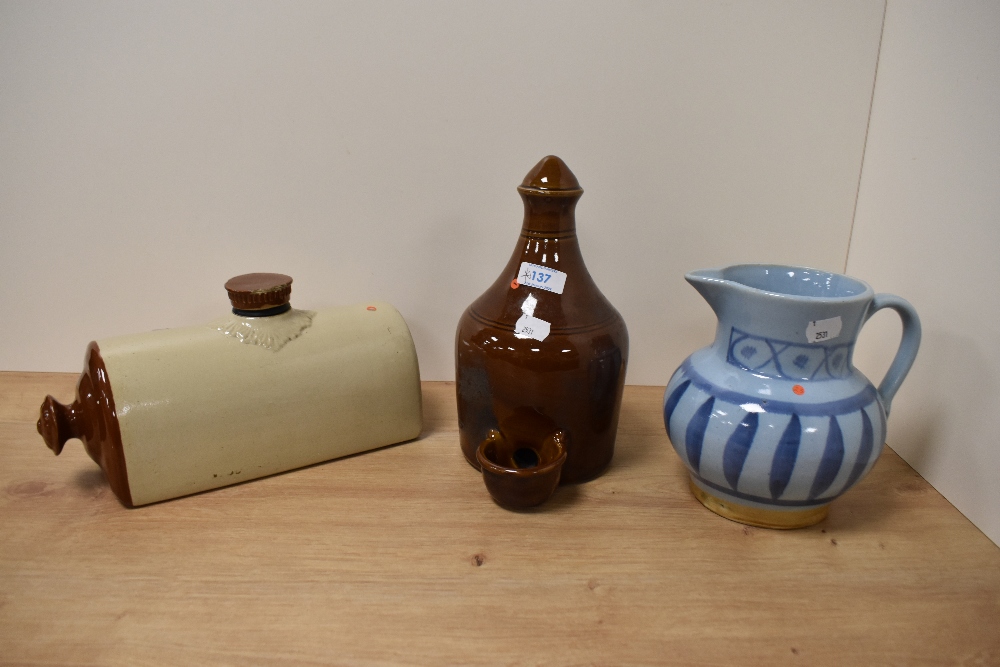 A Buchan Portobello jug having blue ground with repeating leaf like pattern, a stoneware hot water