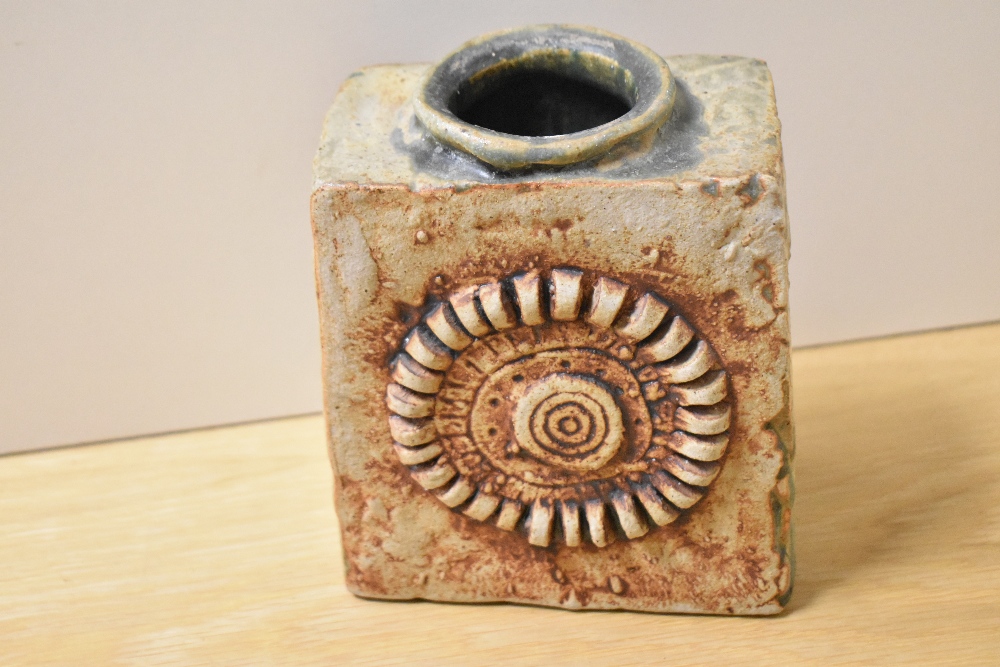 A mid-20th Century Troika style slab vase, on terracotta ground with coil design, stamped 'Made In