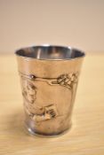 A WMF Britannia metal cup, of flared cylindrical form with Art Nouveau sinuous foliate decoration
