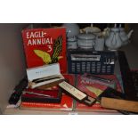 An collection of vintage items, including Eagle Annuals, Parker pens, transistor radio and a