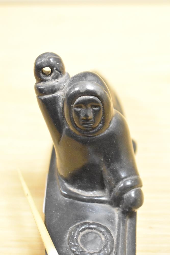 An interesting Canadian Inuit carving of a whale hunter with spear, measuring 25cm long, and - Image 3 of 5