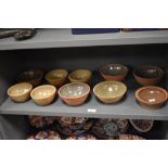 An assorted collection of mid-20th Century studio pottery, to include Coxwold Pottery bowls, the