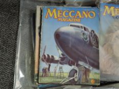 A shelf of 1939 & 1940's Meccano Magazines, some years appear to be complete, 1939, 1940-1944,