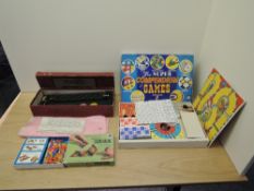 A Dinkie Model Gee-Wiz Game, For Furious Fun, in original box along with a Codeg Super Compendium