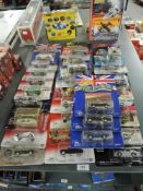 A collection of 29 Johnny Lightning die-casts, 007 40th Anniversary, Retro Rods, Super 70's, The