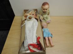 A 1960's Pedigree Celluloid Baby Doll having sleep eyes, open mouth with two teeth showing,