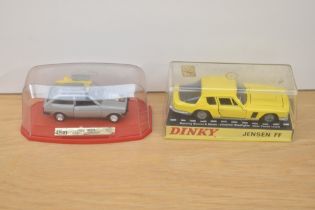 Two die-casts, Dinky 188 Jensen FF and Mira 4518 Ford Fiesta Submarina, both in plastic display