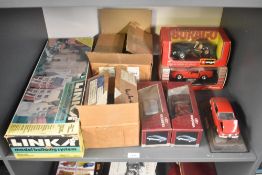 A shelf of mixed toys including Linka Model Building System , Schabak 1:25 scale diecasts, 1500 Ford
