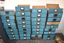 A large collection of Bankers Box interlocking card storage units with extra drawers present