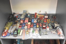 A shelf of playworn die-casts including Dinky, Corgi, Matchbox Lesney etc, Military.Chitty Chitty