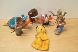 A collection of 1960's & 1970's Toys, Japanese tin plate and clockwork Bear Reading, Bear Fishing