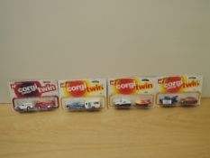 Four 1970's Corgi Twin die-cast sets, 2504, 2513, 2518 and 2525, all in window bubble display boxes,