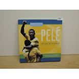 A volume, Pele My Life In Pictures by Simon & Schuster, in original slip case