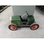 A modern wooden Strega Rocking Car, vintage model car with adjustable wheel for access to seat, turn