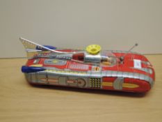 A 1980's Chinese tin plate and battery operated Space Rocket Car with turning radar, yellow