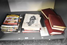 A shelf of diecast model related magazines and reference books including Model Auto Review, Ramsay's