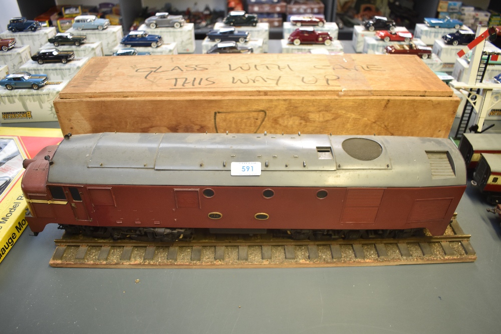 A G Scale/Gauge possible scratch built Diesel Locomotive numbered D1 750 in burgundy livery, with