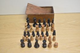 A part turned wooden Chess Set of Staunton or Jaques type, King height 7cm, in wooden box with