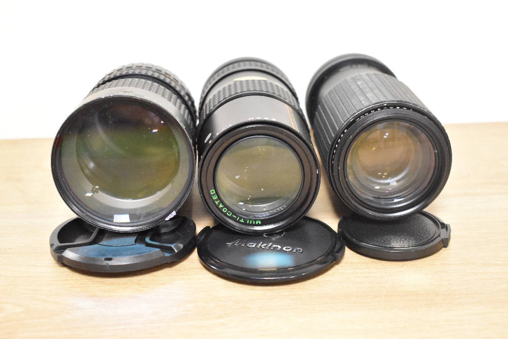 Six Makinon lenses. Two MC Auto Zoom 1:4,5 80-200mm, three MC Auto Zoom 1:3,5-4,5 28-80mm, a MC Auto - Image 3 of 6