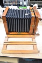 A mahogany cased English studio camera 8.5'x8.5' with extension rail