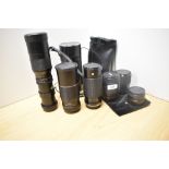 Six Various lenses. A Tokina RMC 1:3,5 300mm, a Upsilon 1:3,5 200mm, a Paragon 1:5,6 300mm, A