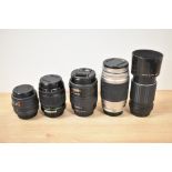 Five SMC Pentax lenses. A FA 1:3,5-4,7 28-80mm, a F Zoom 1:3,5-4,5 35-70mm, a DA 1:4,5-5,6 50-200mm,