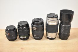 Five SMC Pentax lenses. A FA 1:3,5-4,7 28-80mm, a F Zoom 1:3,5-4,5 35-70mm, a DA 1:4,5-5,6 50-200mm,