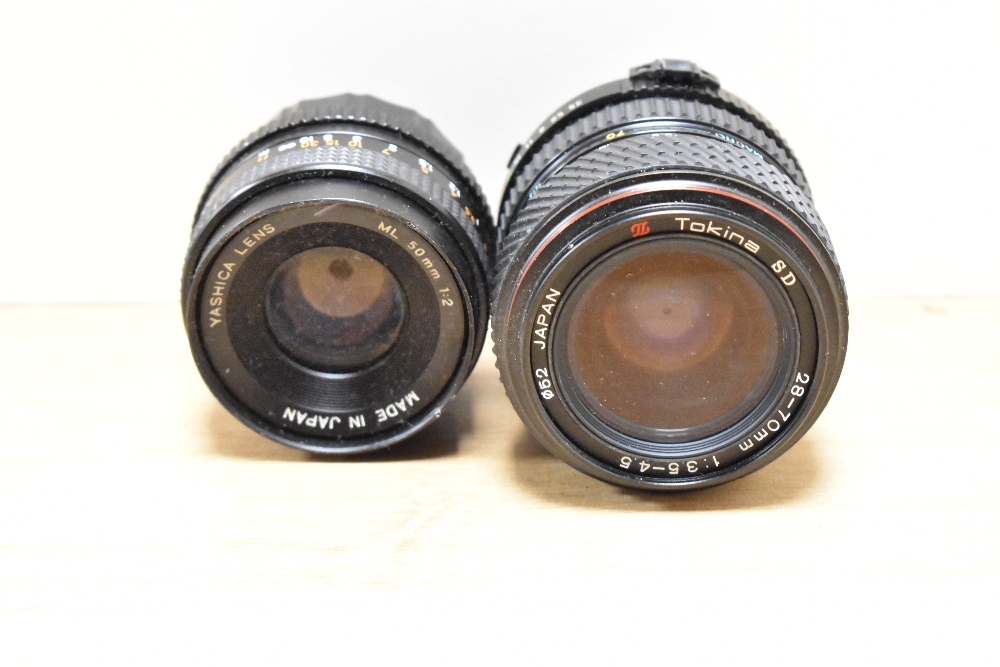 Four various lenses. A Tokina SD 1:3,5-4,5 28-70mm, a Yashica Auto Zoom 1:2 50mm, a Yashinon Auto - Image 3 of 5