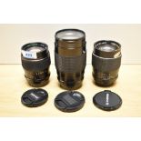 Three Chinon lenses. A MC 1:2,8 135mm, an Auto 1:2,8 135mm and an Auto MC 1:3,5 200mm