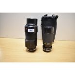 Two Tamron lenses. A 1:3,8-4 70-210mm and an AF Zoon Internal focus 1:4 70-210mm