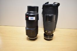 Two Tamron lenses. A 1:3,8-4 70-210mm and an AF Zoon Internal focus 1:4 70-210mm