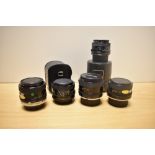 Five Tamron Lenses. An Adaptall 2 1:2,5 24mm, an Adaptal 2 1:2,5 28mm and a three 1:2,8 28mm