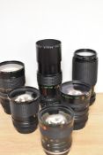 Six Makinon lenses. Two MC Auto Zoom 1:4,5 80-200mm, three MC Auto Zoom 1:3,5-4,5 28-80mm, a MC Auto