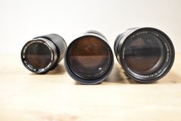 Three Vivitar lenses. An Auto Zoon 1:4,5 75-260mm, a Close Focusing Auto Zoom 1:5 100-300mm and a MC