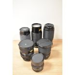 Six various lenses. An Ensinor MC Auto Zoom Macro 1:4,5 80-200mm, a Topman MC Zoom C-Macro 1:4,5