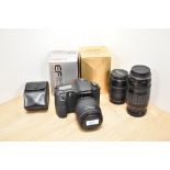 A Canon EOS10D camera with charger having Sigma 1:4-5,6 70-210mm lens, Canon Zoom EF 1:4,5-5,6 100-