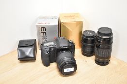 A Canon EOS10D camera with charger having Sigma 1:4-5,6 70-210mm lens, Canon Zoom EF 1:4,5-5,6 100-