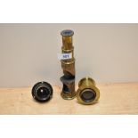 Two brass lenses one marked Lancaster Time 8 and a brass Microscope AF
