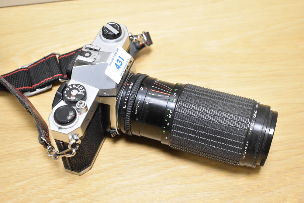 A Pentax K1000 camera No5385153 with Sigma High speed zoom 1:3,5-5,4 f80-200mm lens No505623 in soft - Image 2 of 4